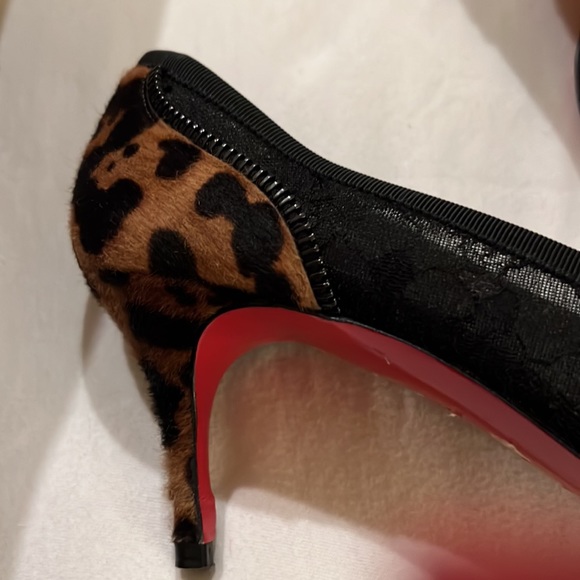 Louboutin lace with animal print with zipper bows. Beautiful shoes. Runs narrow. - Picture 4 of 10